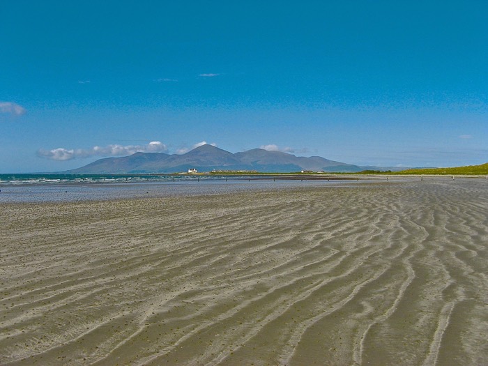 Rippled open sand at Tyrella Beach with the Mourne Mountains across Dundrum Bay