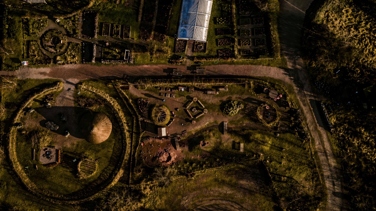 An aerial look over the crannóg and heritage gardens laid out behind the centre.