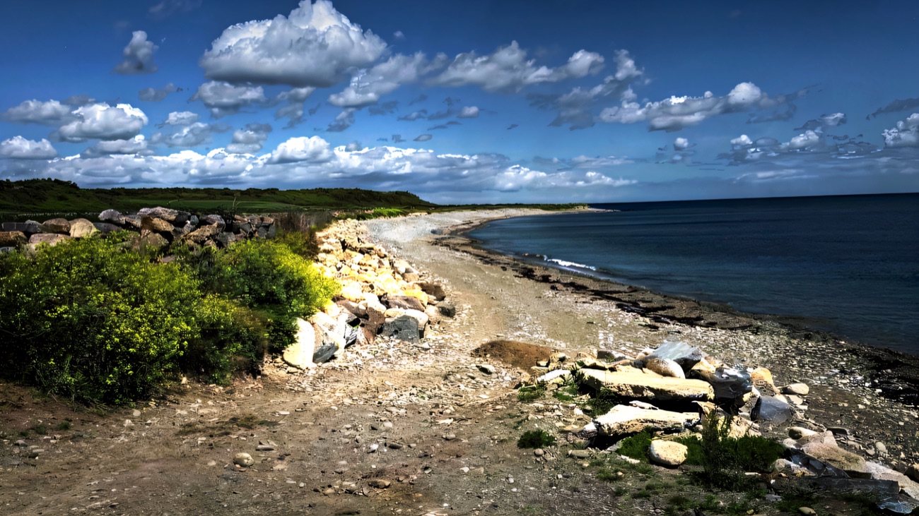 The shingle shore path running south toward Glasdrumman