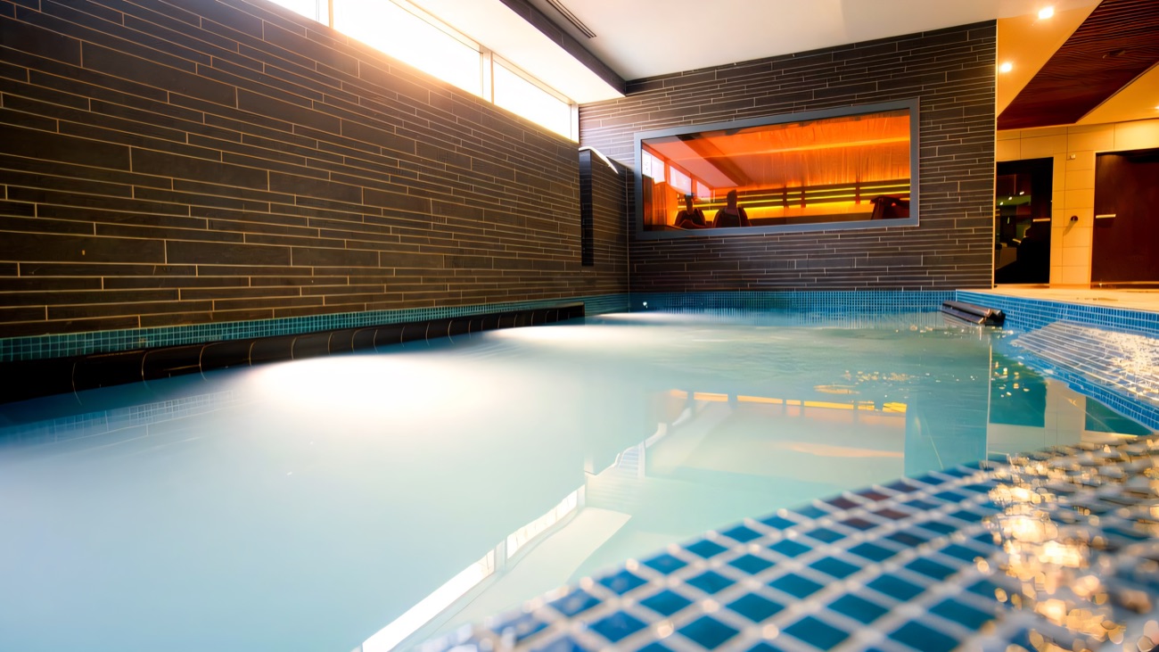 The warm spa pool, with the sauna glowing through the window