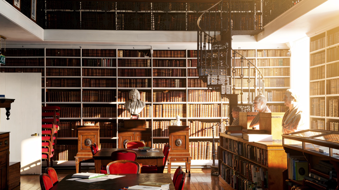 Marble busts keep watch over the tiered shelves and the spiral iron staircase to the gallery.