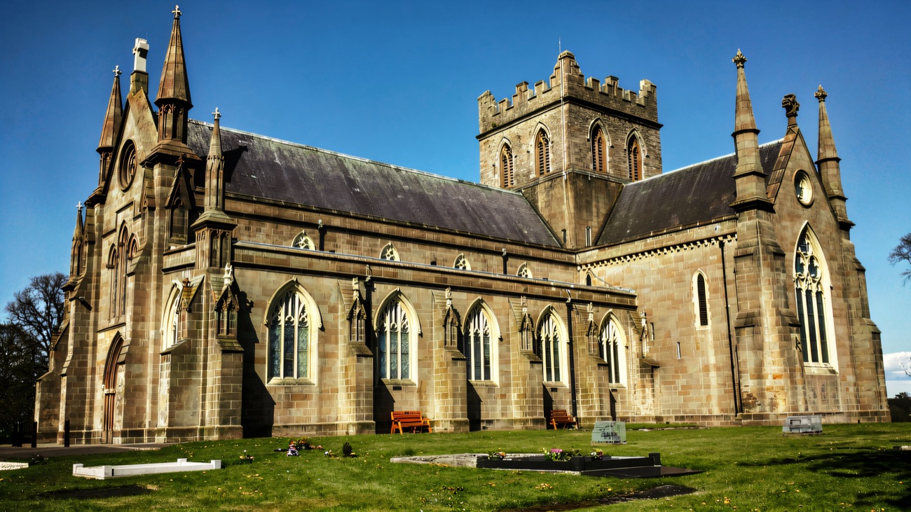The south side under spring sunshine, thought to stand on the site of St Patrick's first church