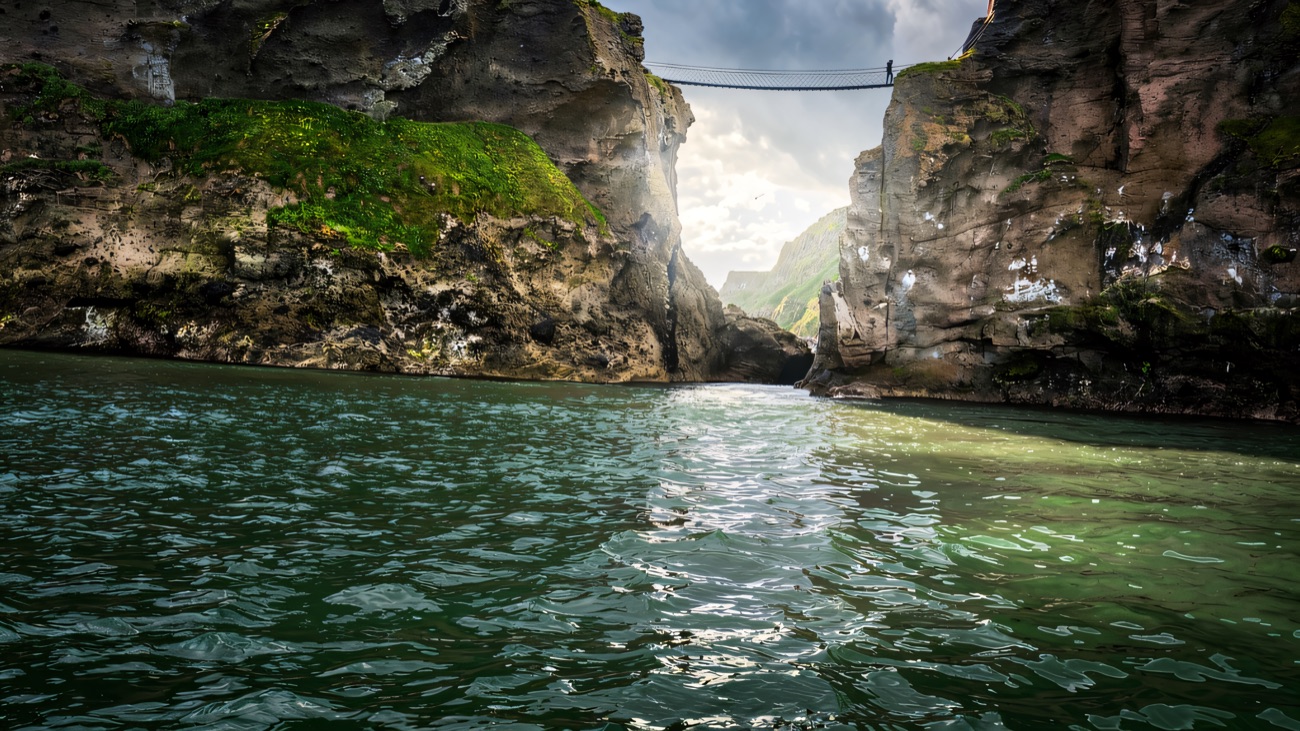 Looking up from sea level at the famous rope bridge slung between two sea stacks