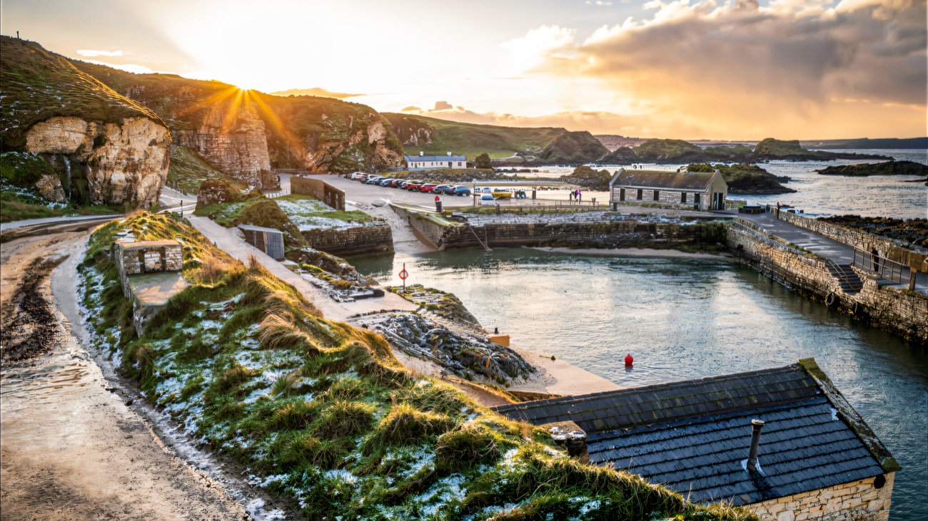 The harbour at sunrise on a frosty morning, stone cottages by the water