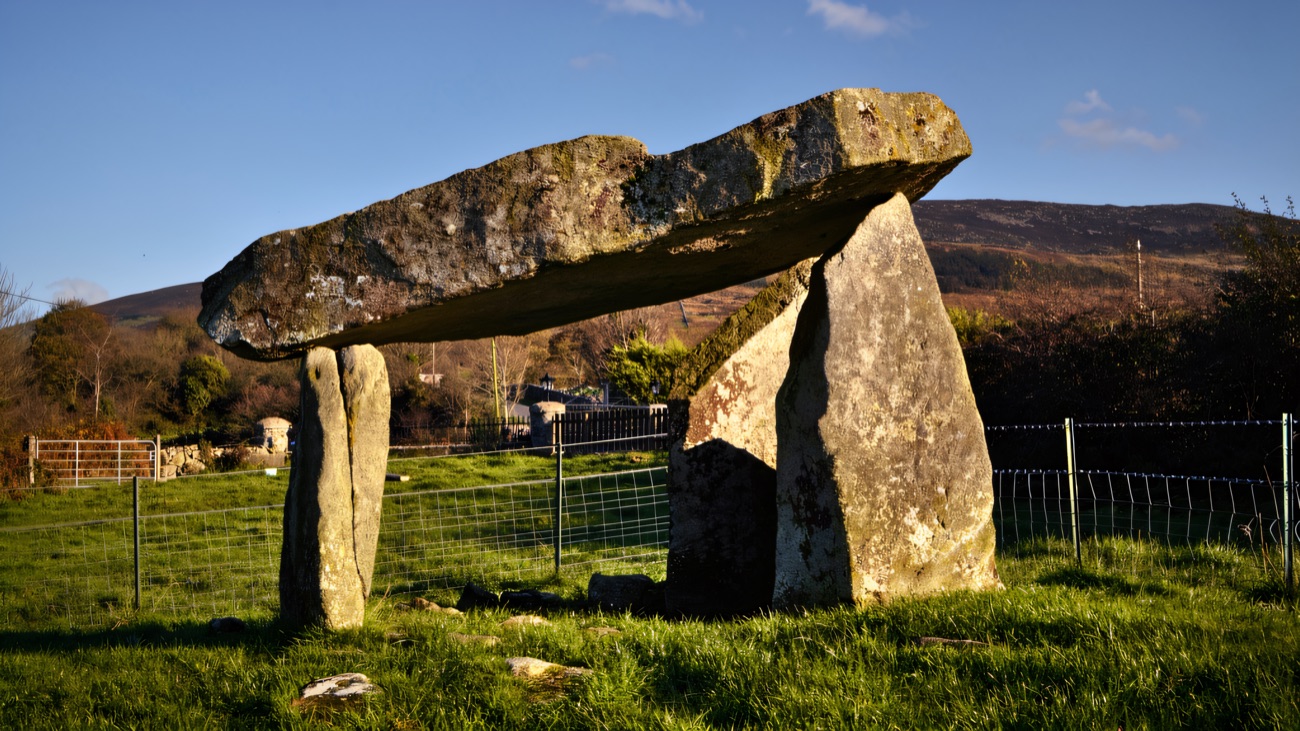 The dolmen in profile with the mountain beyond, thought to be around 5,000 years old