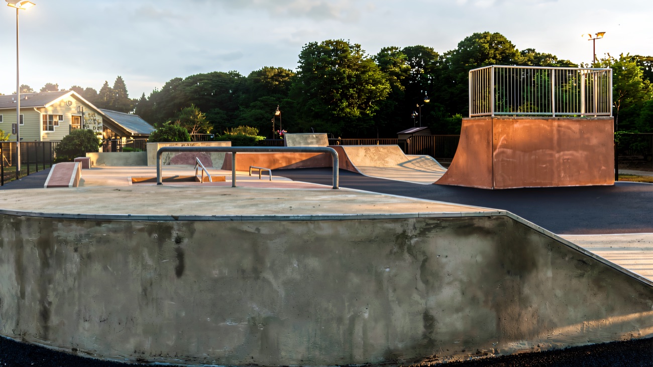 Concrete ledges, ramps and a raised platform in the park