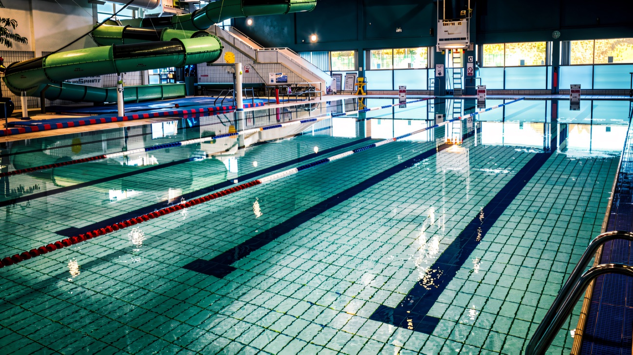 The pool with its blue flumes curling down into the water
