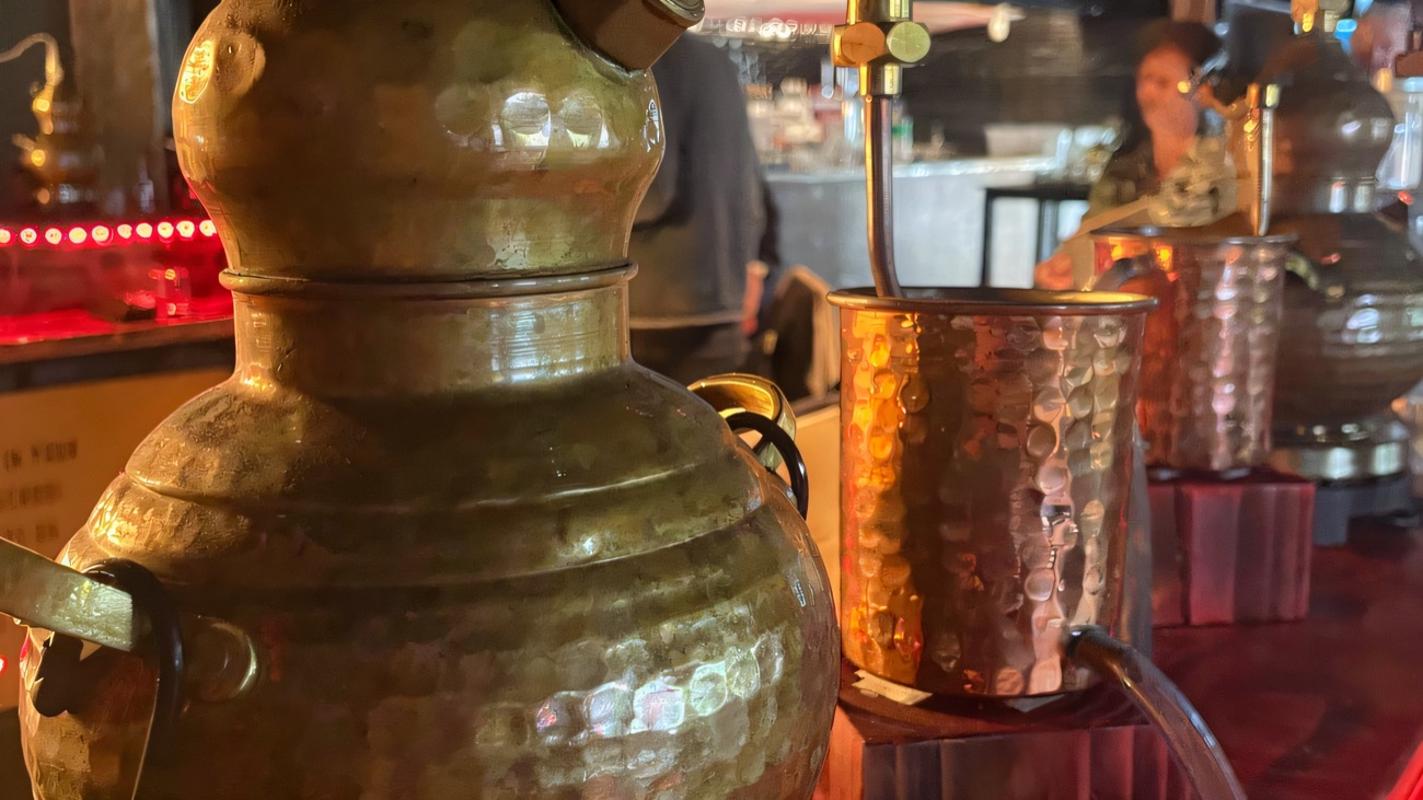 The copper alembic stills at the bar