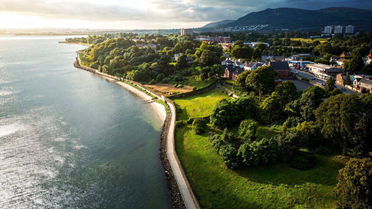 From above, the greenway follows the lough shore toward the hills