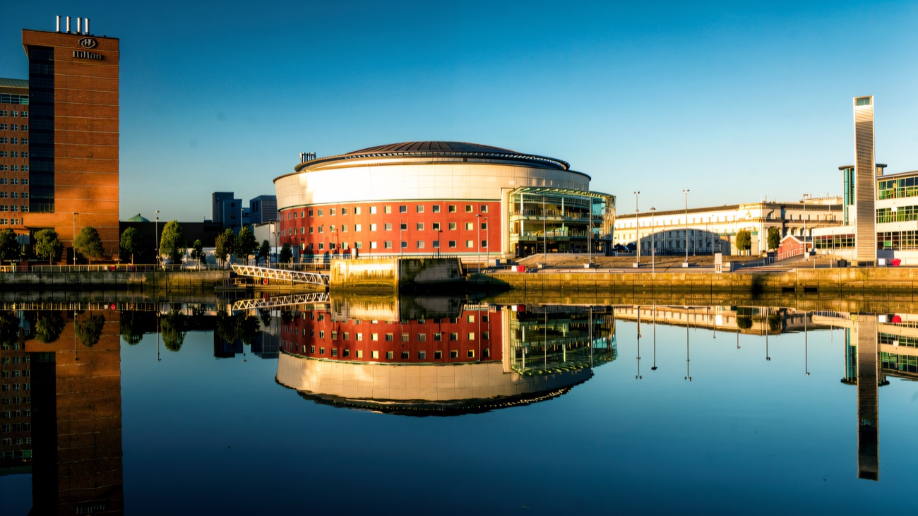 The landmark dome mirrored in the River Lagan