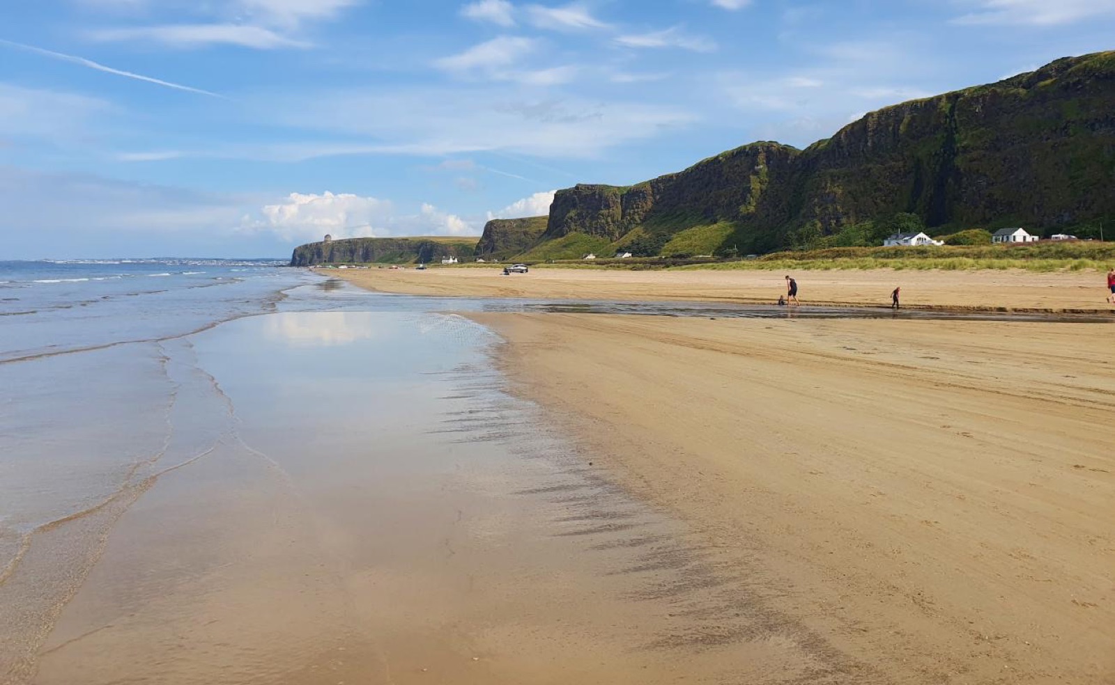 Golden sand at Benone Strand with Mussenden Temple in view