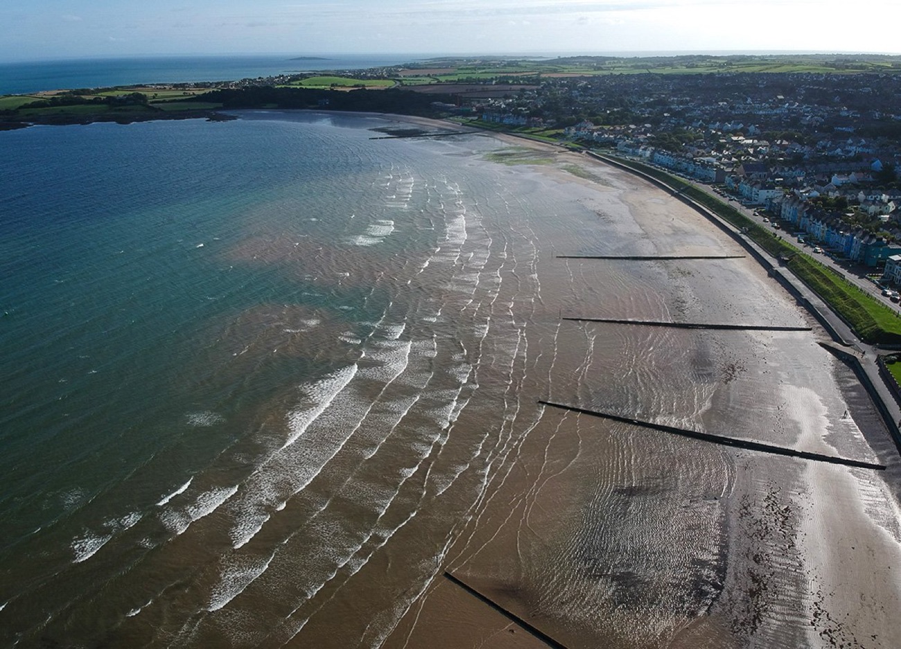 Aerial view of the sweep of Ballyholme Bay at Bangor — Brompton Bay sits at the corner of this shoreline