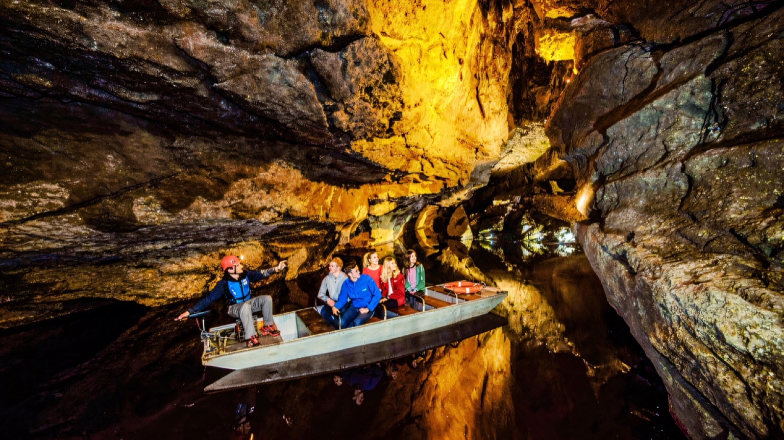 Family boat ride on the underground river at Marble Arch Caves