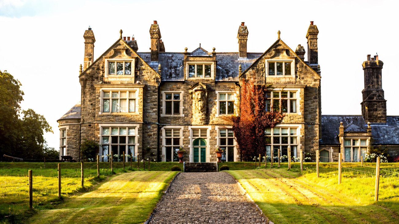 The grey-stone Victorian manor at Blessingbourne, seen head-on across the lawn