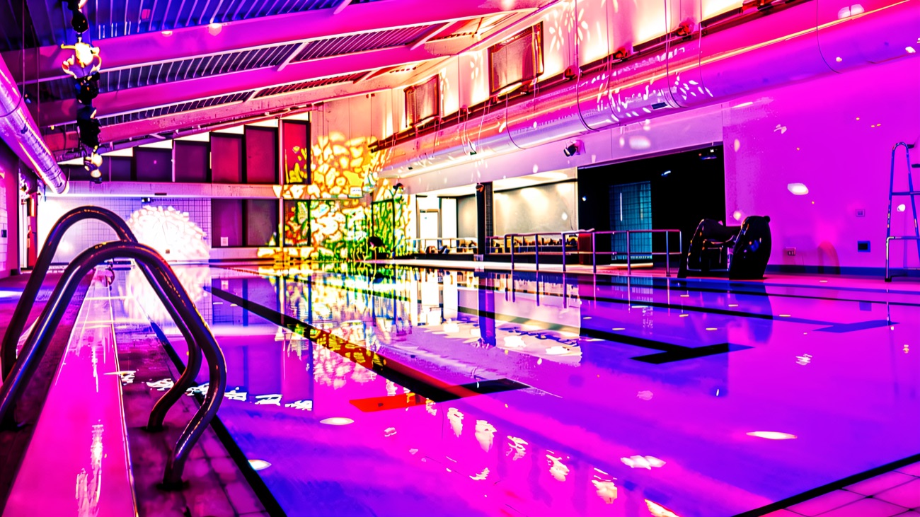 The pool lit up pink and purple with dancing disco lights