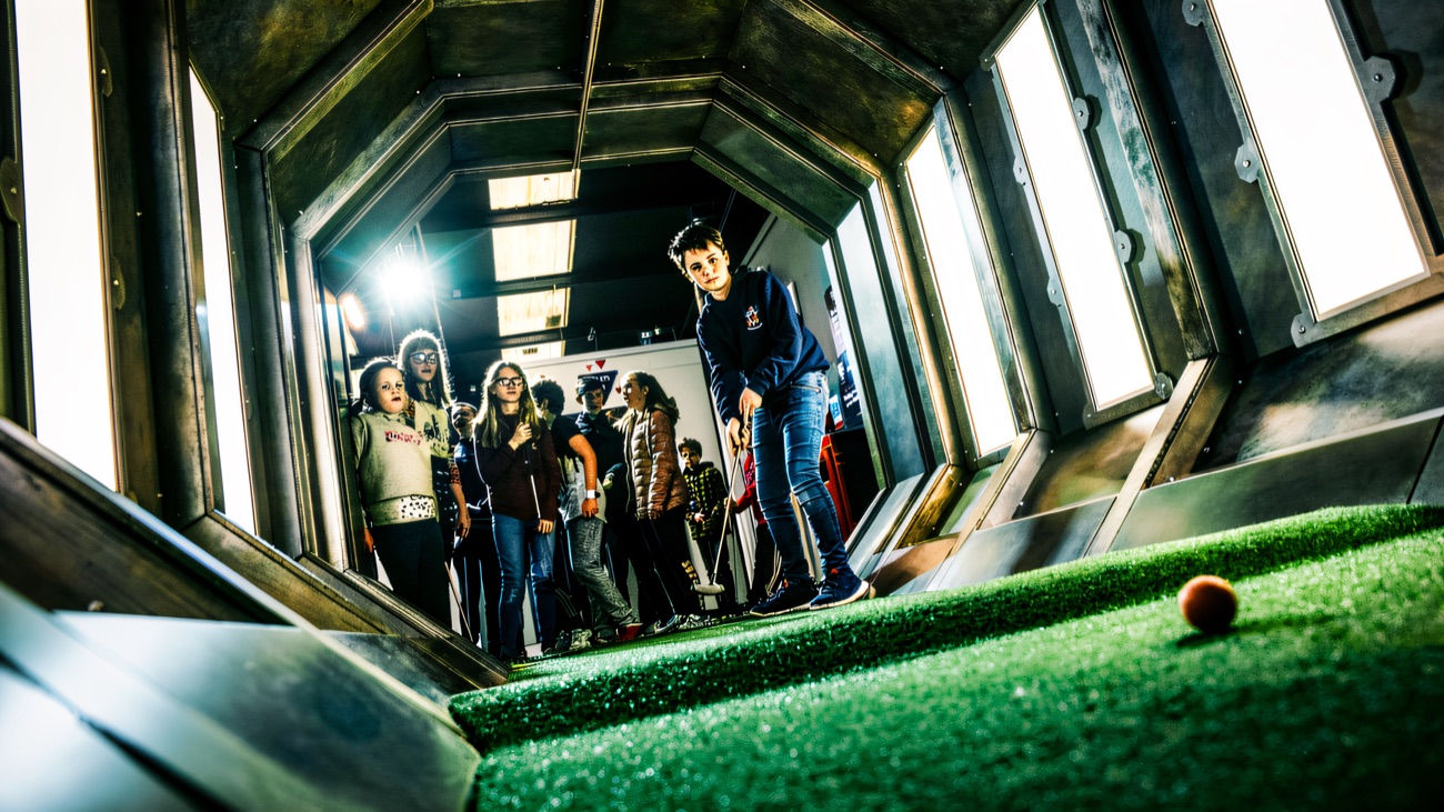 Players tackle the spaceship-corridor tunnel hole