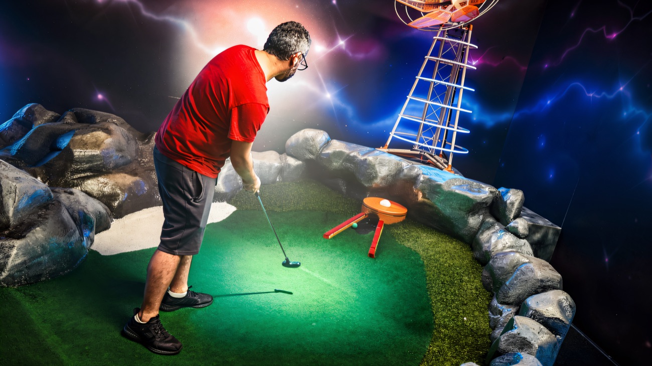 Putting out at a space-tower hole surrounded by cosmic wall art