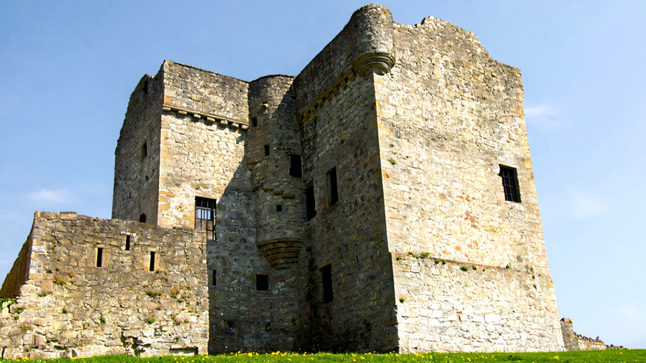 Close-up of Castle Balfour's twin tower blocks with the corbelled stair turret and projecting bay between them