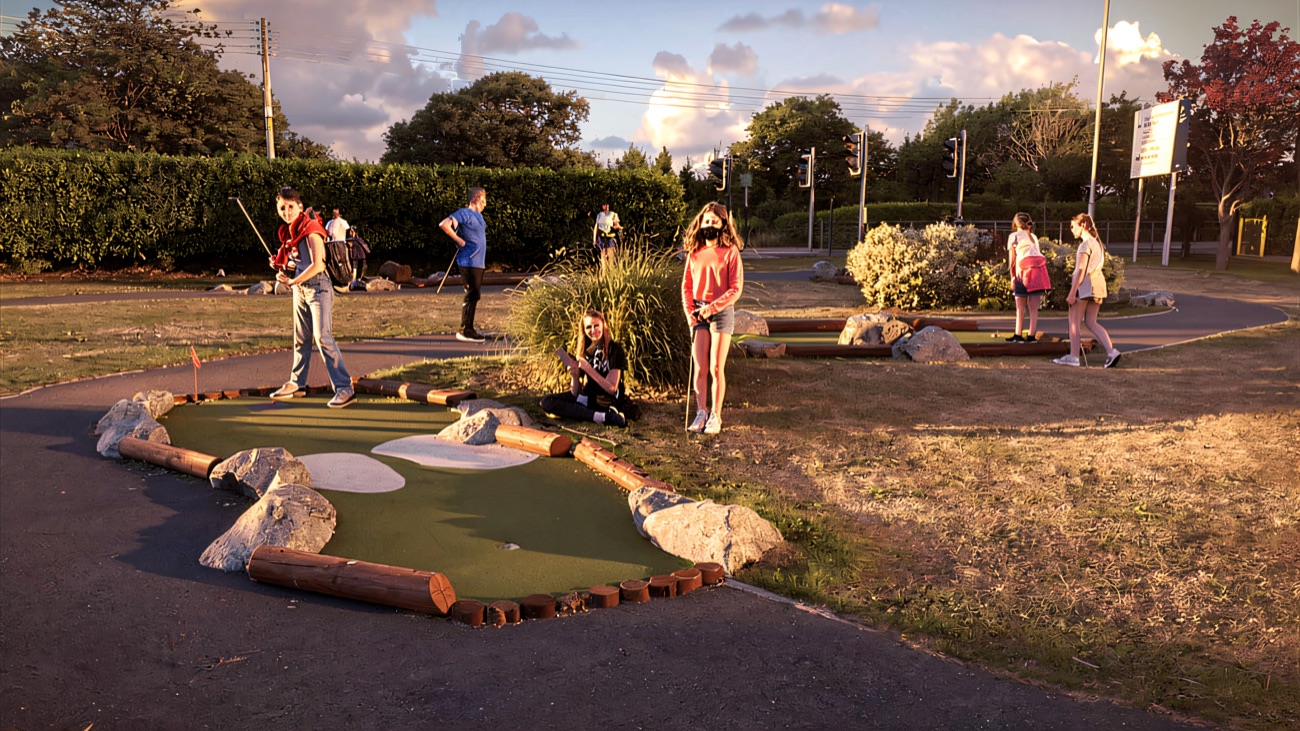 Youngsters putting round the crazy golf holes at Castle Park on the Newcastle seafront