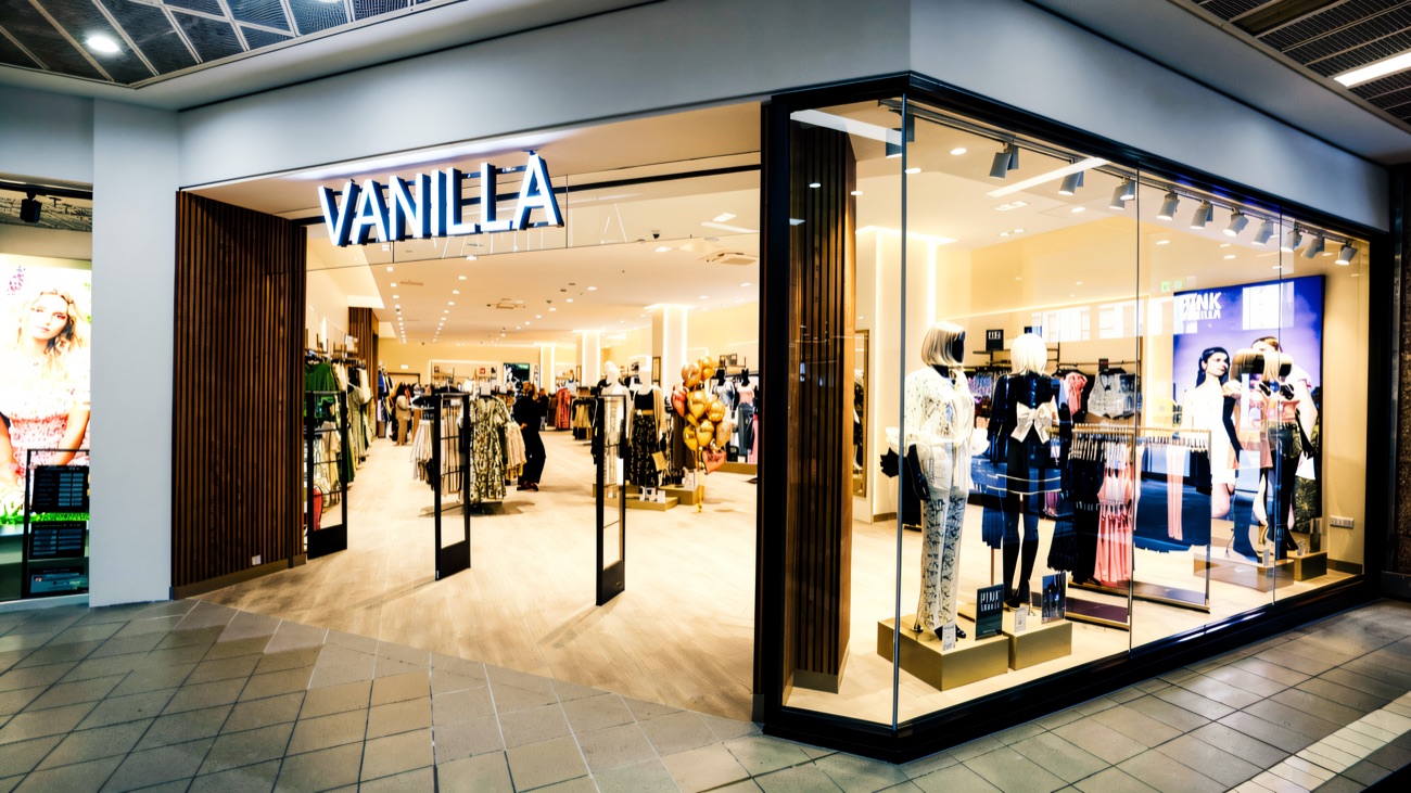 A bright glass-fronted fashion store on the mall level inside CastleCourt Shopping Centre