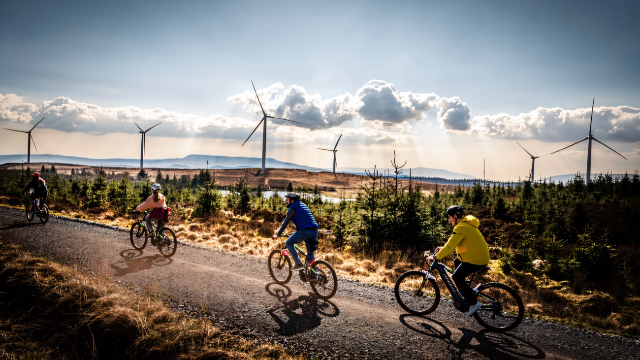 E-biking the upland tracks past the turbines and big open sky