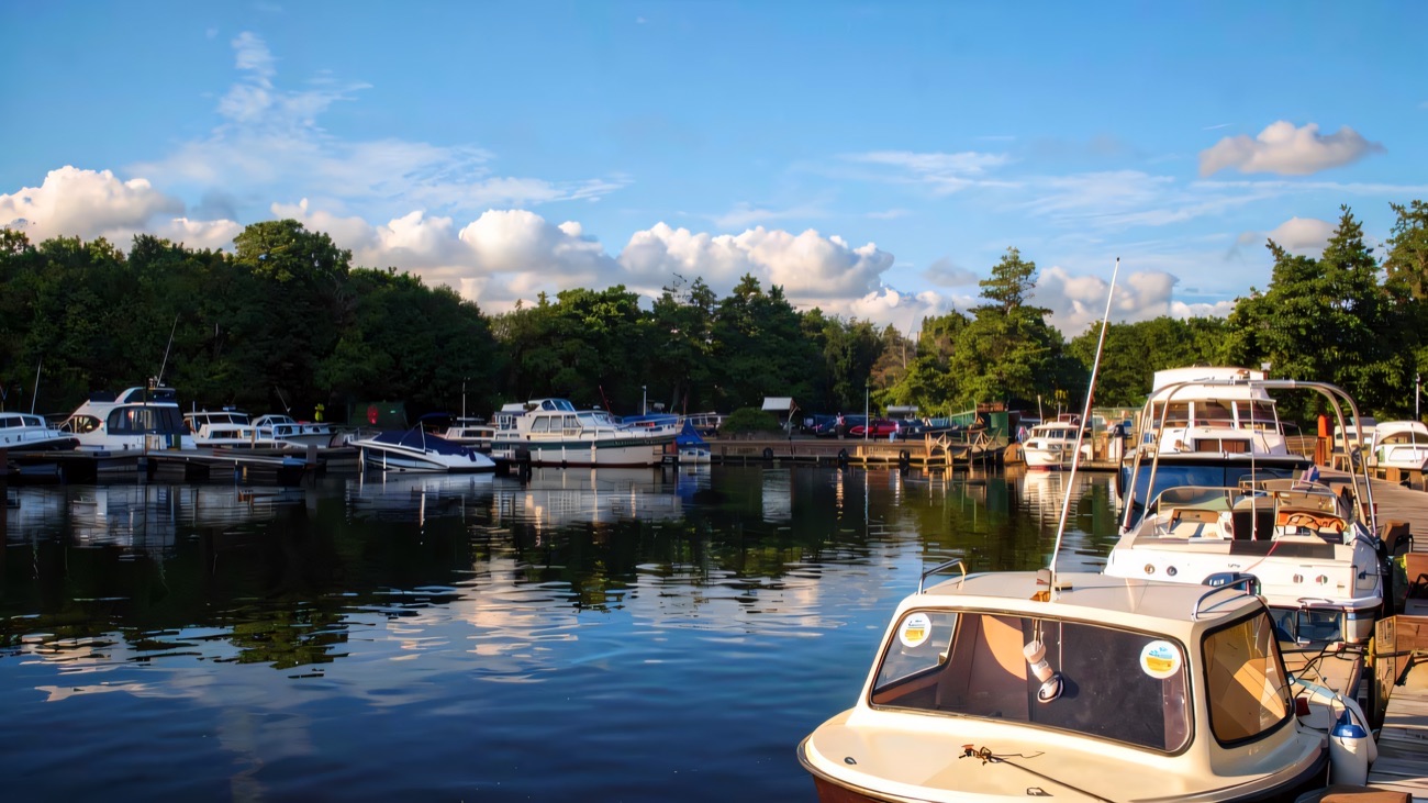 Boats moored in the sunny marina at Castle Archdale on Lower Lough Erne
