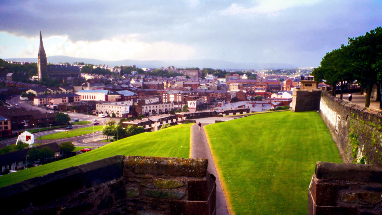 The view from the walls out over the rooftops to the cathedral spire and hills