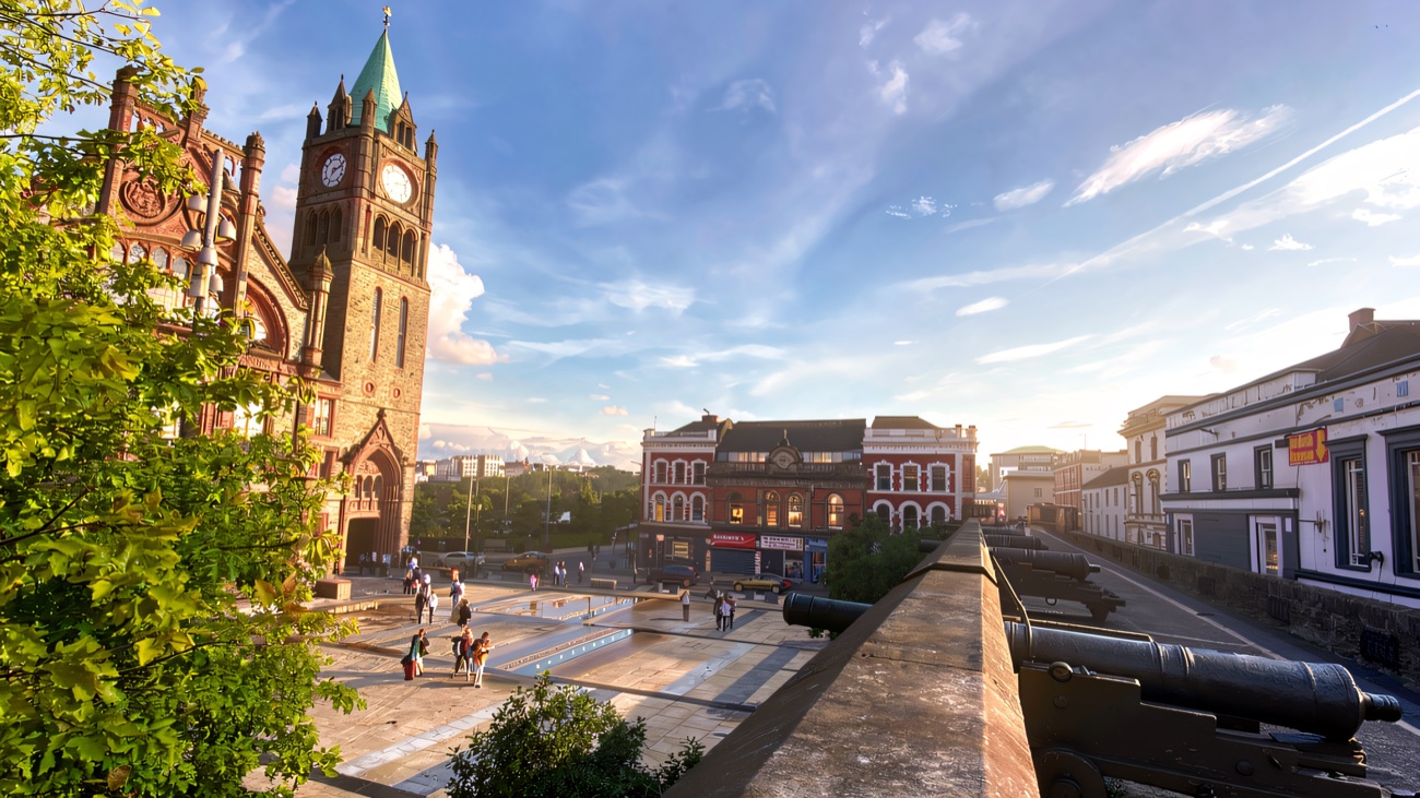 View from the walls over Guildhall Square, the Guildhall clock tower and a line of cannon