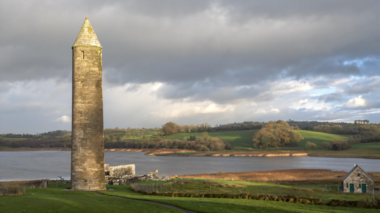 The perfect round tower catching dramatic autumn light on Lower Lough Erne