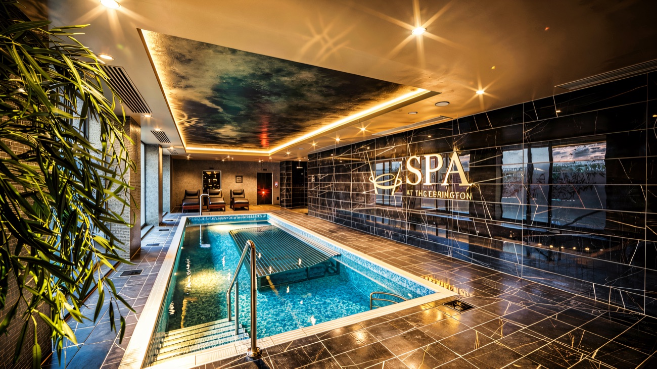 The hydrotherapy pool with its jets, framed by the Spa at The Ebrington signage on the wall.