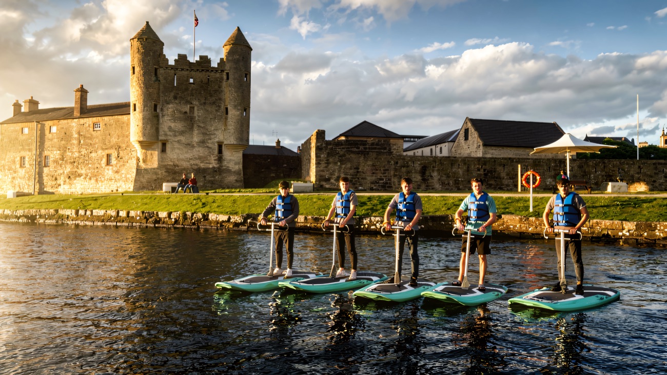 eBoards lined up in front of Enniskillen Castle on the Erne