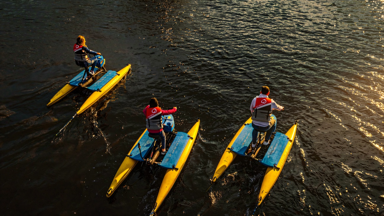 Hydrobikes drawn out across the water, seen from above