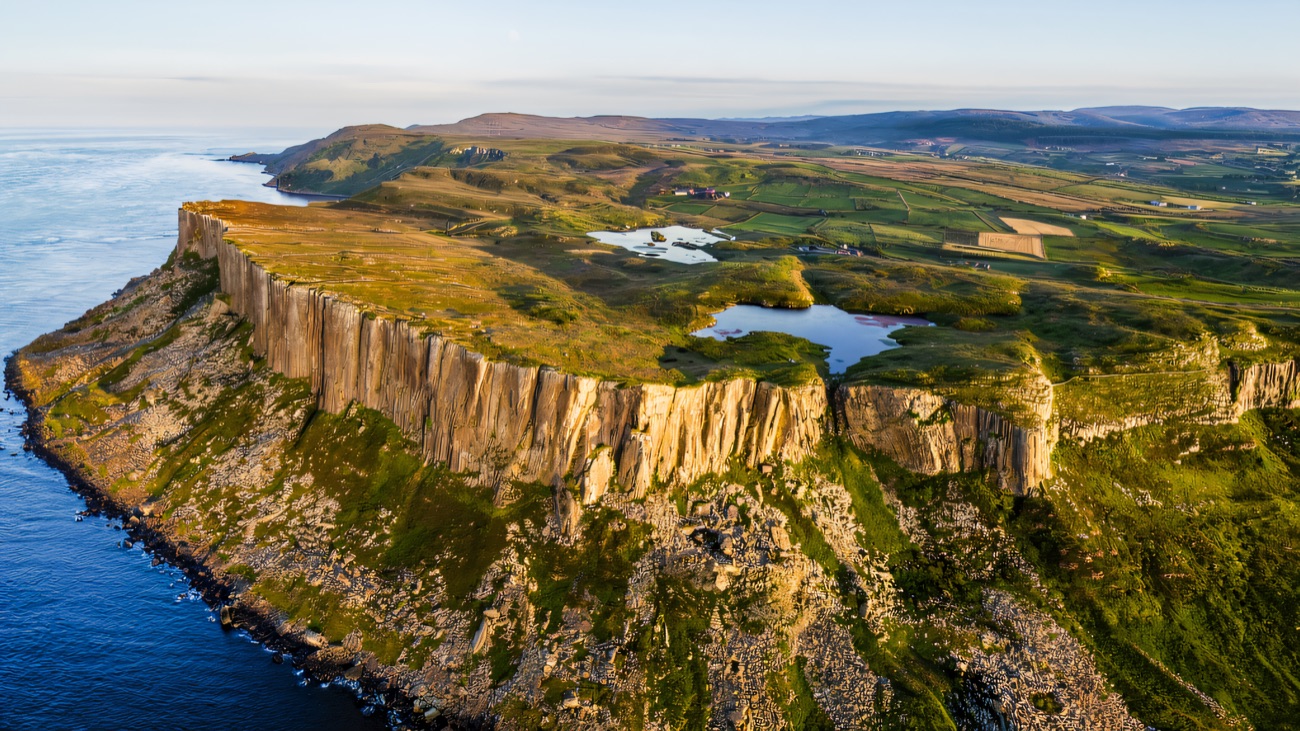 The basalt wall of Fair Head from the air