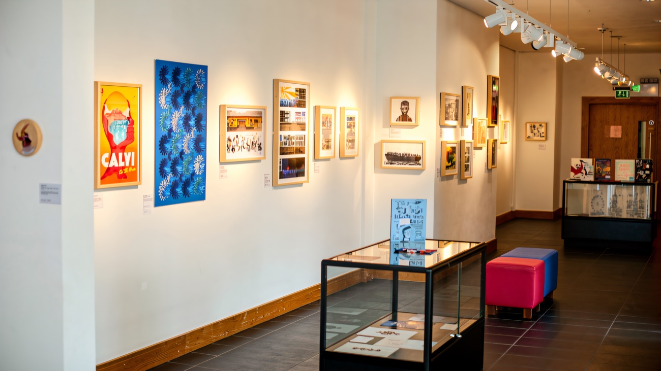 The bright gallery hung with work