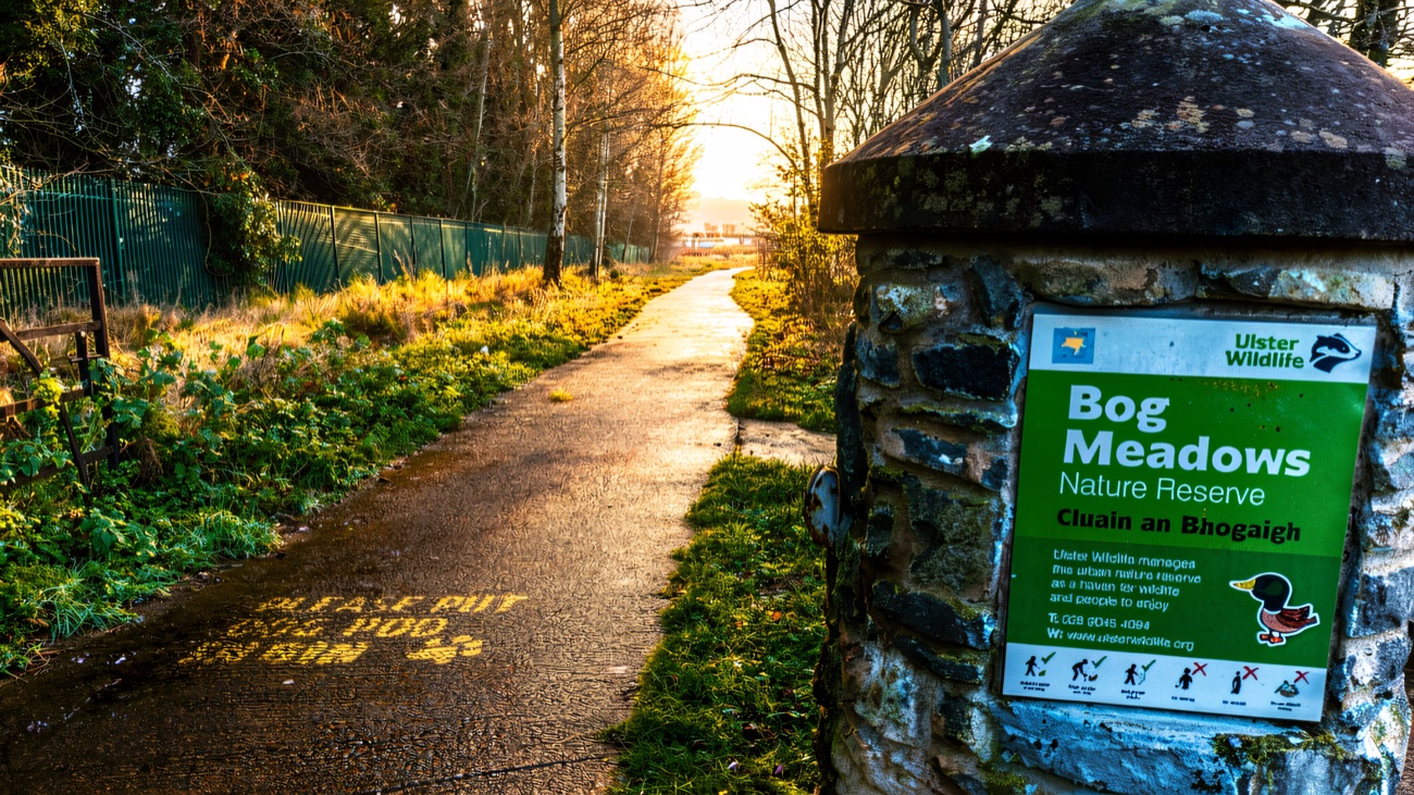 The path passing the entrance to Bog Meadows Nature Reserve