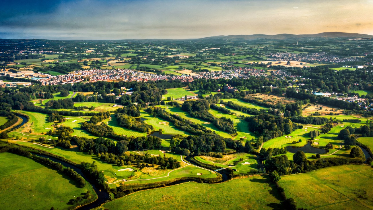 Aerial view of the Galgorm estate — the golf course and the River Maine winding through the parkland