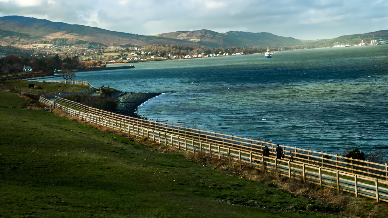 A fenced path running along the shore of Carlingford Lough