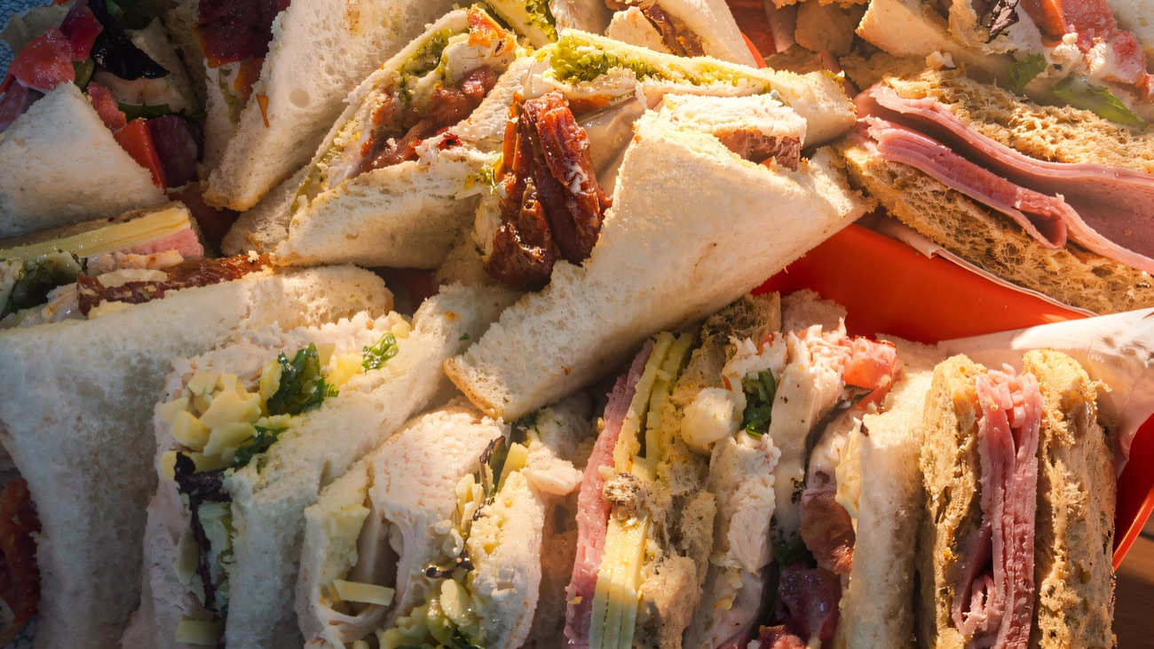 A platter of mixed sandwiches made up for a party
