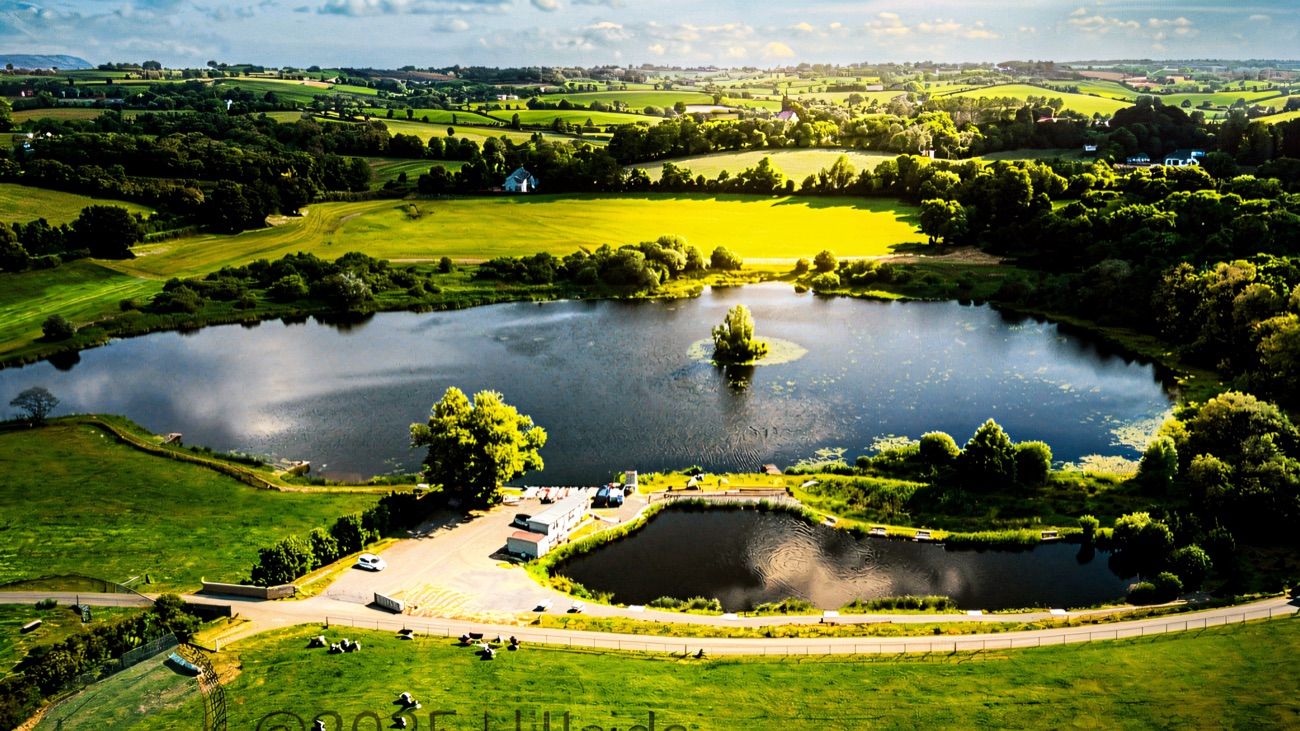 Aerial view over the fishery lakes and surrounding fields