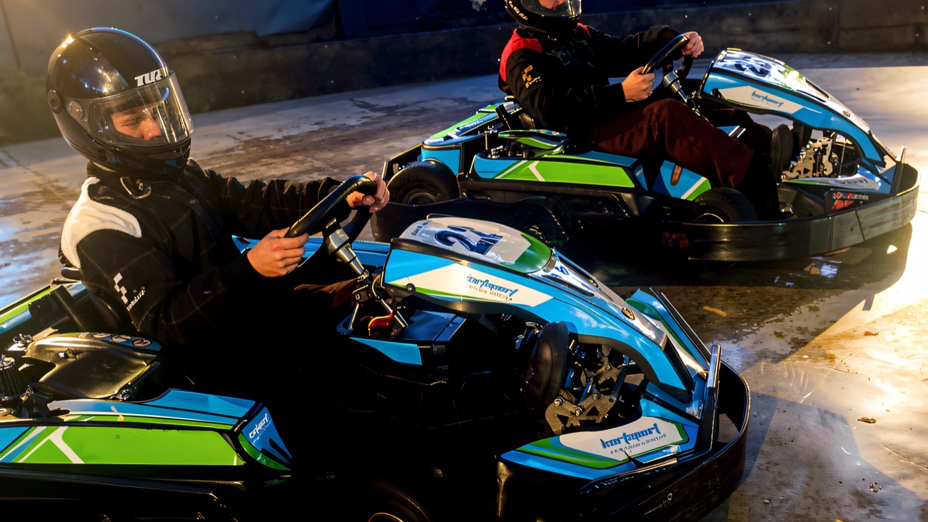Two drivers side by side in Kartsport's karts at Ballymoney