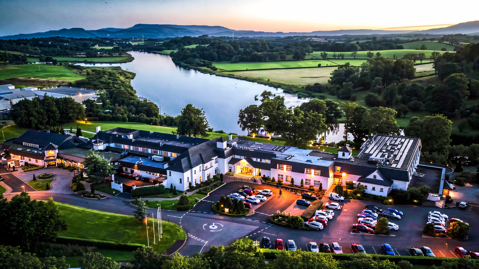 Killyhevlin Lakeside Hotel from the air at dusk, on the shore of Lough Erne.