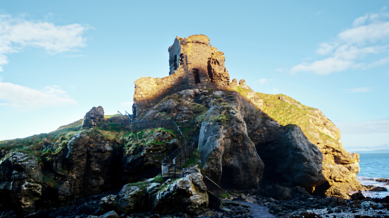 The castle ruins perched on their rock, reached by a steep flight of steps.