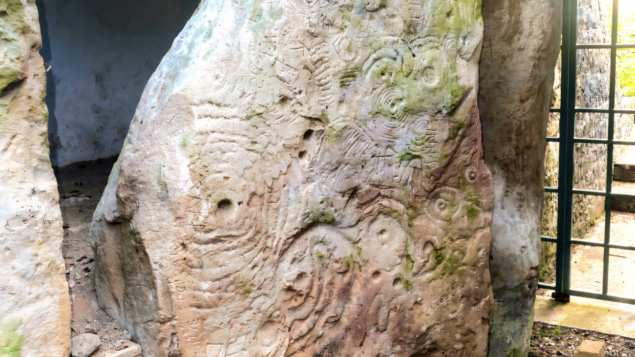 One of the decorated stones, carved with spirals and concentric circles.