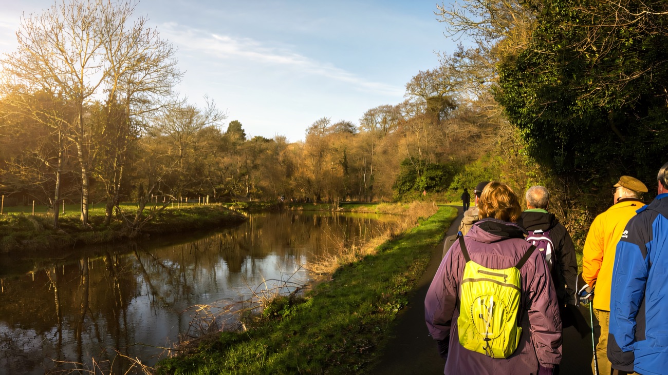 Walkers following the towpath on a bright winter morning