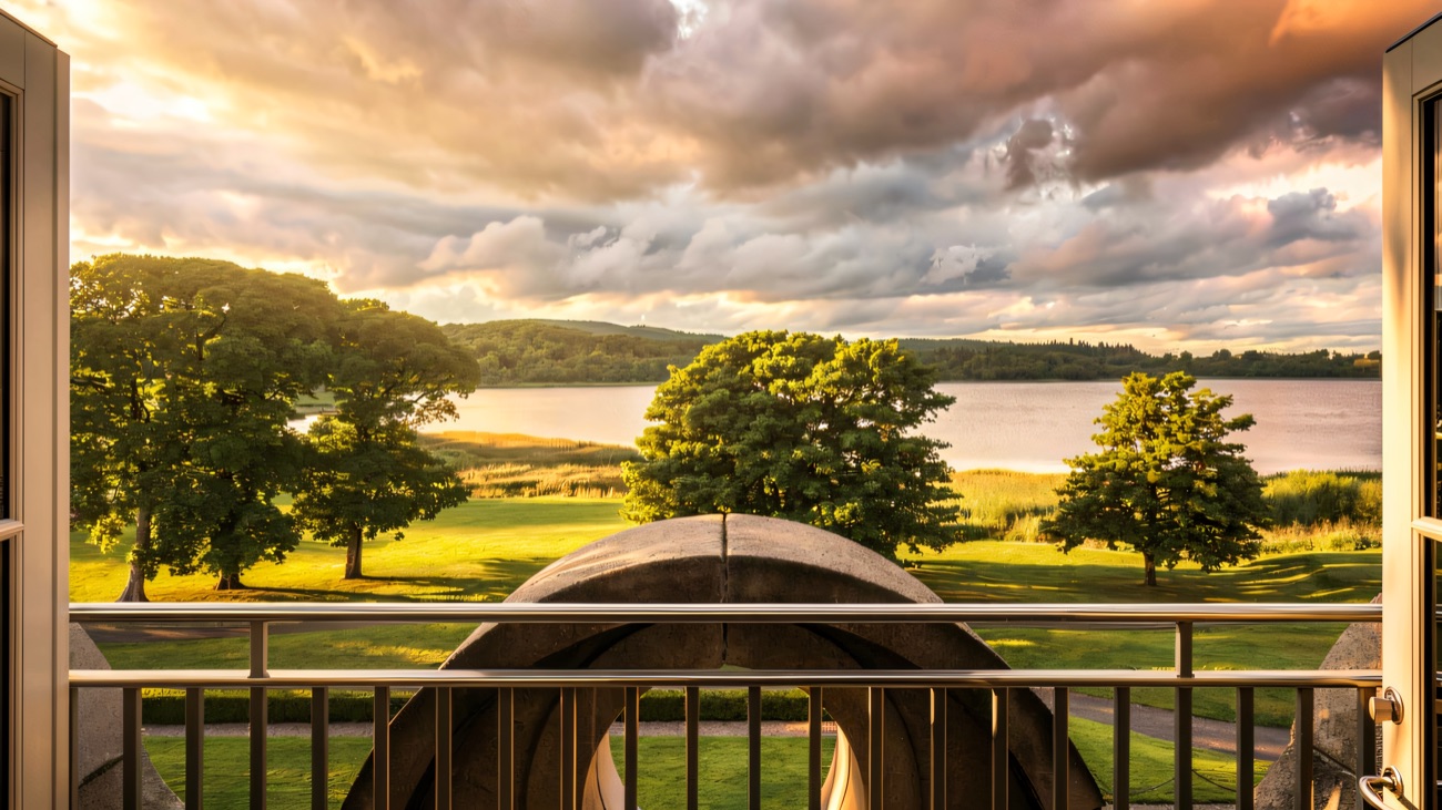 Trees and parkland frame the view out over Castle Hume Lough.