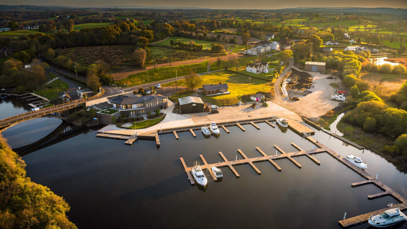 Pontoons and moorings reaching out into the calm lough