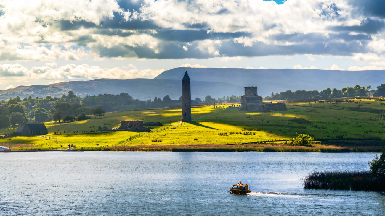 Devenish Island rises from the water, its round tower a landmark on the lough.