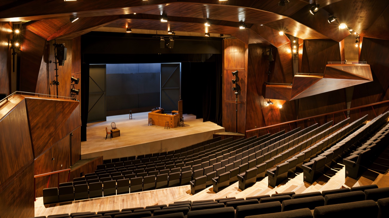 The warm timber-lined main auditorium