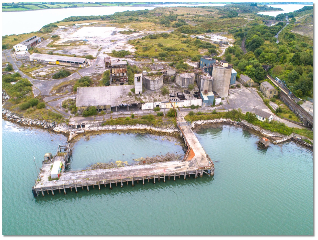 The abandoned quarry buildings and old jetty at Magheramorne on the edge of Larne Lough