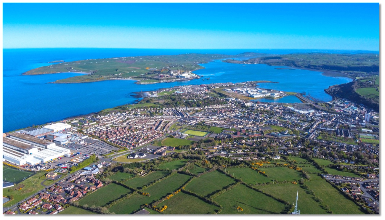 Aerial of Larne Lough and the town with the sea beyond